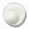 Hydrate shampoo in a white bowl with foam, for healthy hair care.